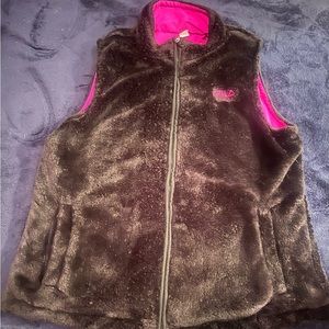 Women’s size l Fila reversible vest with one side black and the other pink